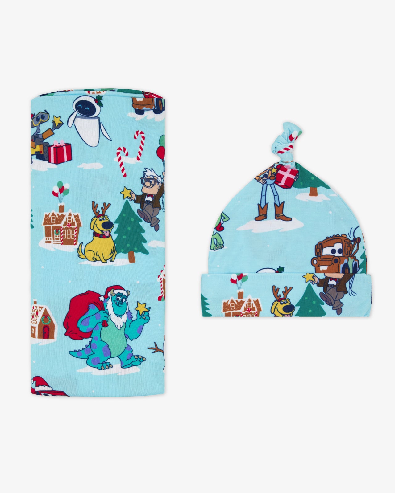 Flat lay of the Disney & Pixar Christmas Village Swaddle & Hat Set