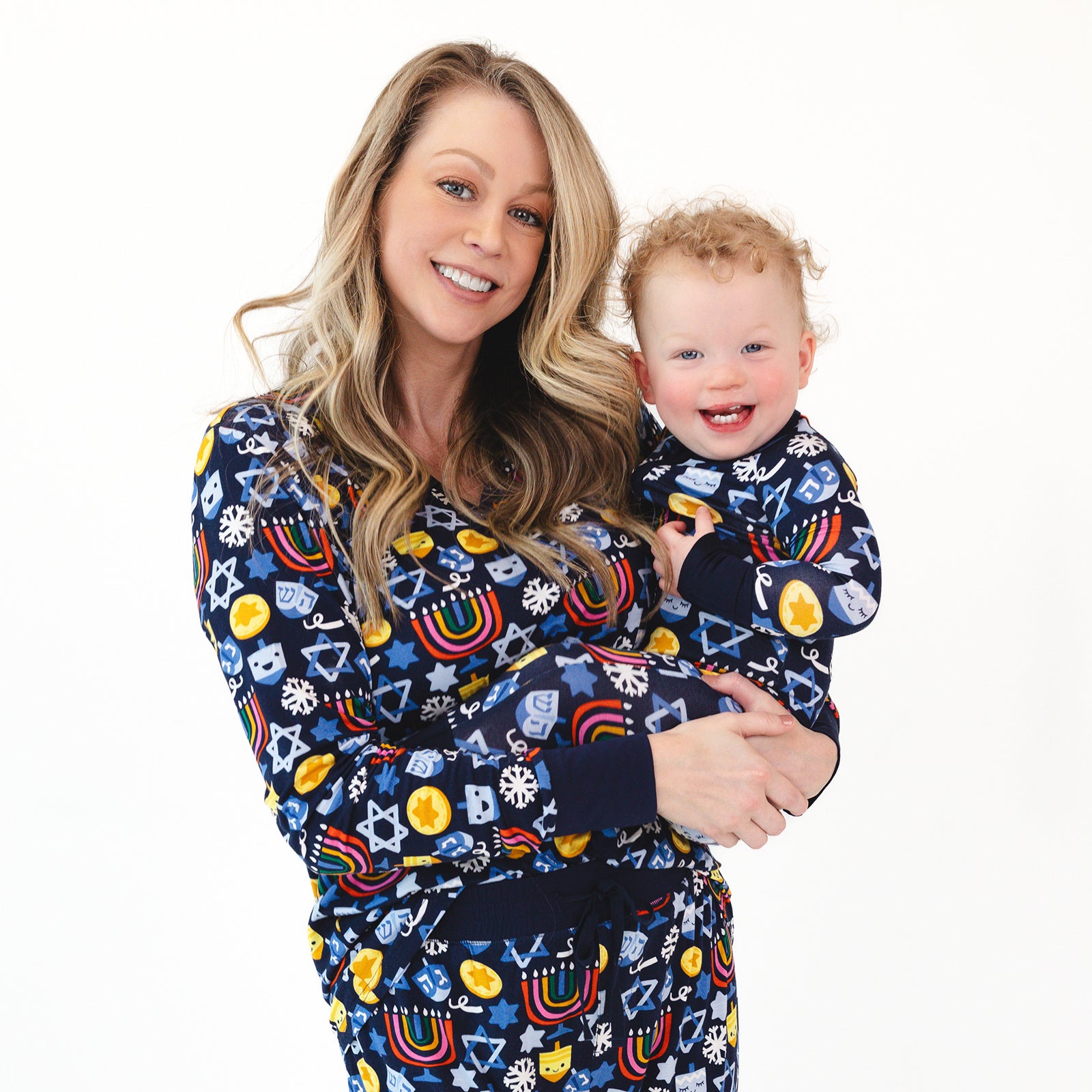 Mother and child wearing matching Playful Dreidels pajamas