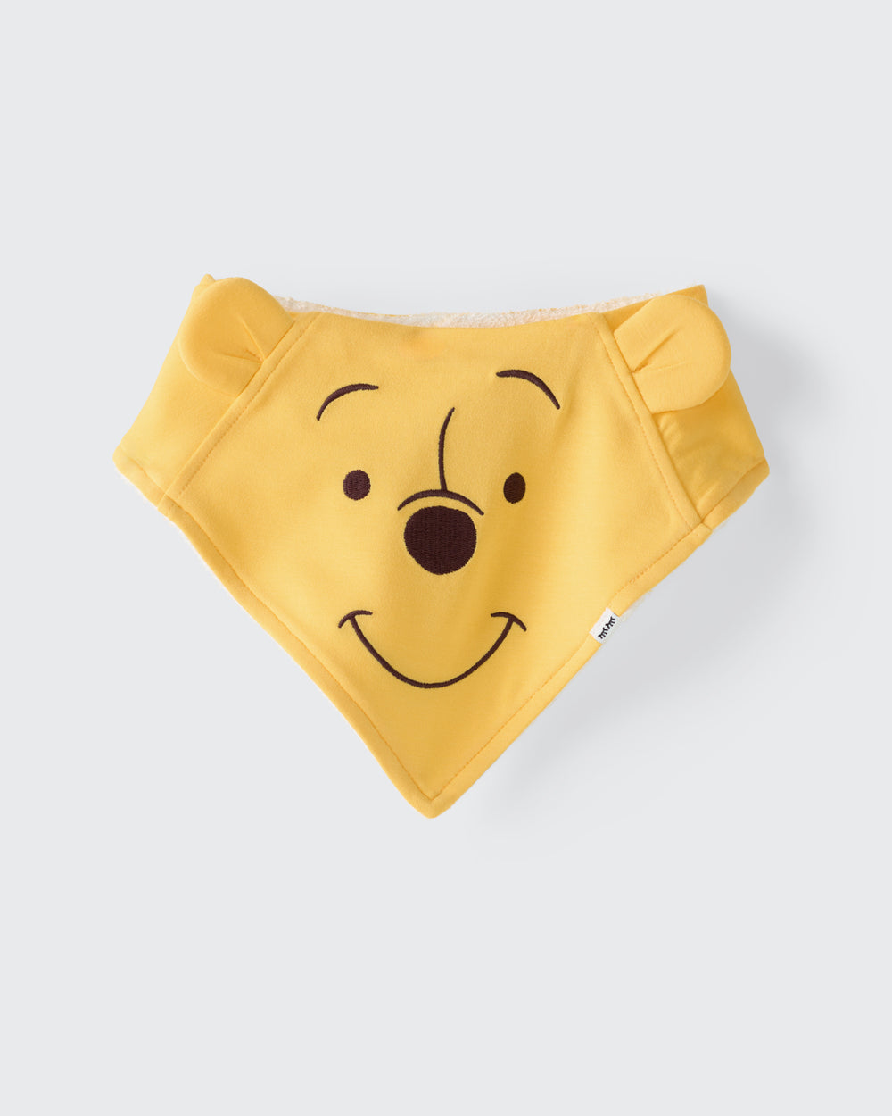 Flat lay of the Disney Winnie The Pooh Bandana Bib