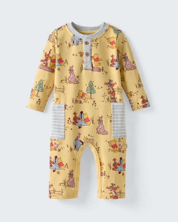 Flat lay of the Disney Playtime With Pooh Henley Romper