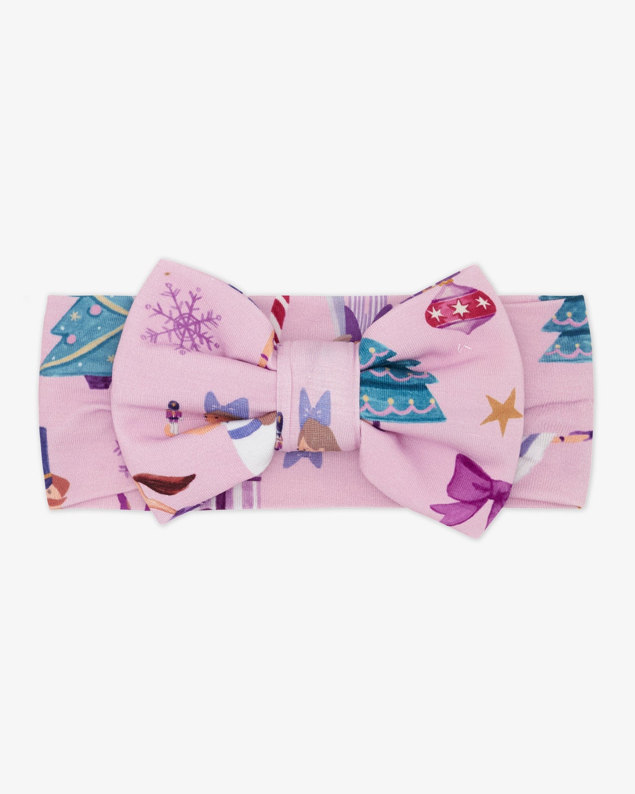 Flat lay of the Nutcracker Ballet Luxe Bow Headband