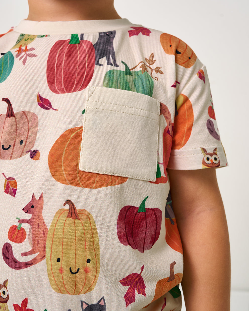 Close up of the pocket detail on the Pumpkin Pals Relaxed Pocket Tee