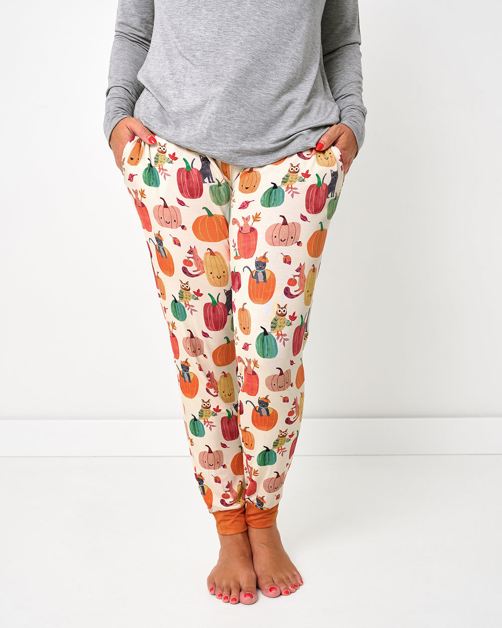 Woman wearing the Pumpkin Pals Women's Pajama Pants