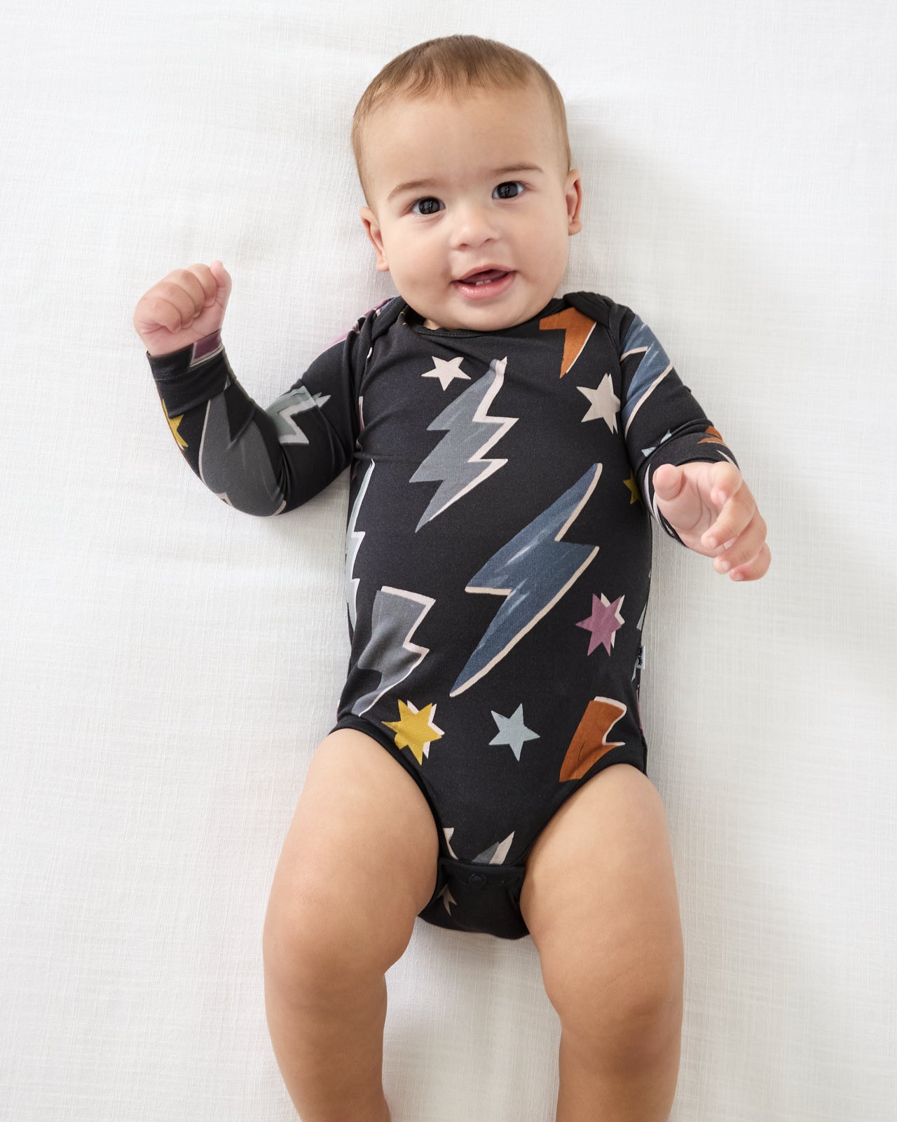 Aerial view of child wearing the Rad Bolts Bodysuit