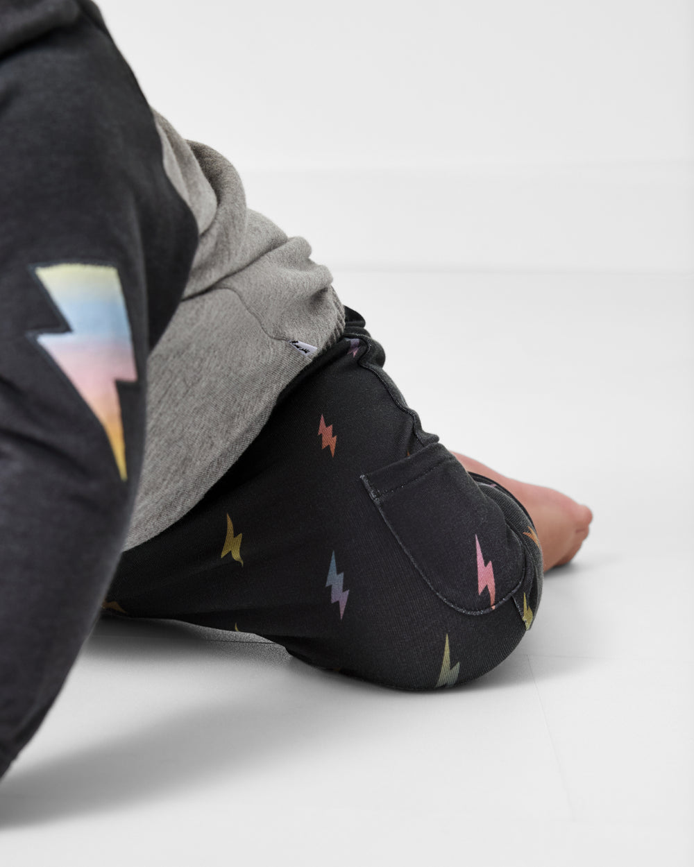 Close up of crawling child wearing the Rad Bolts Cinched Jogger