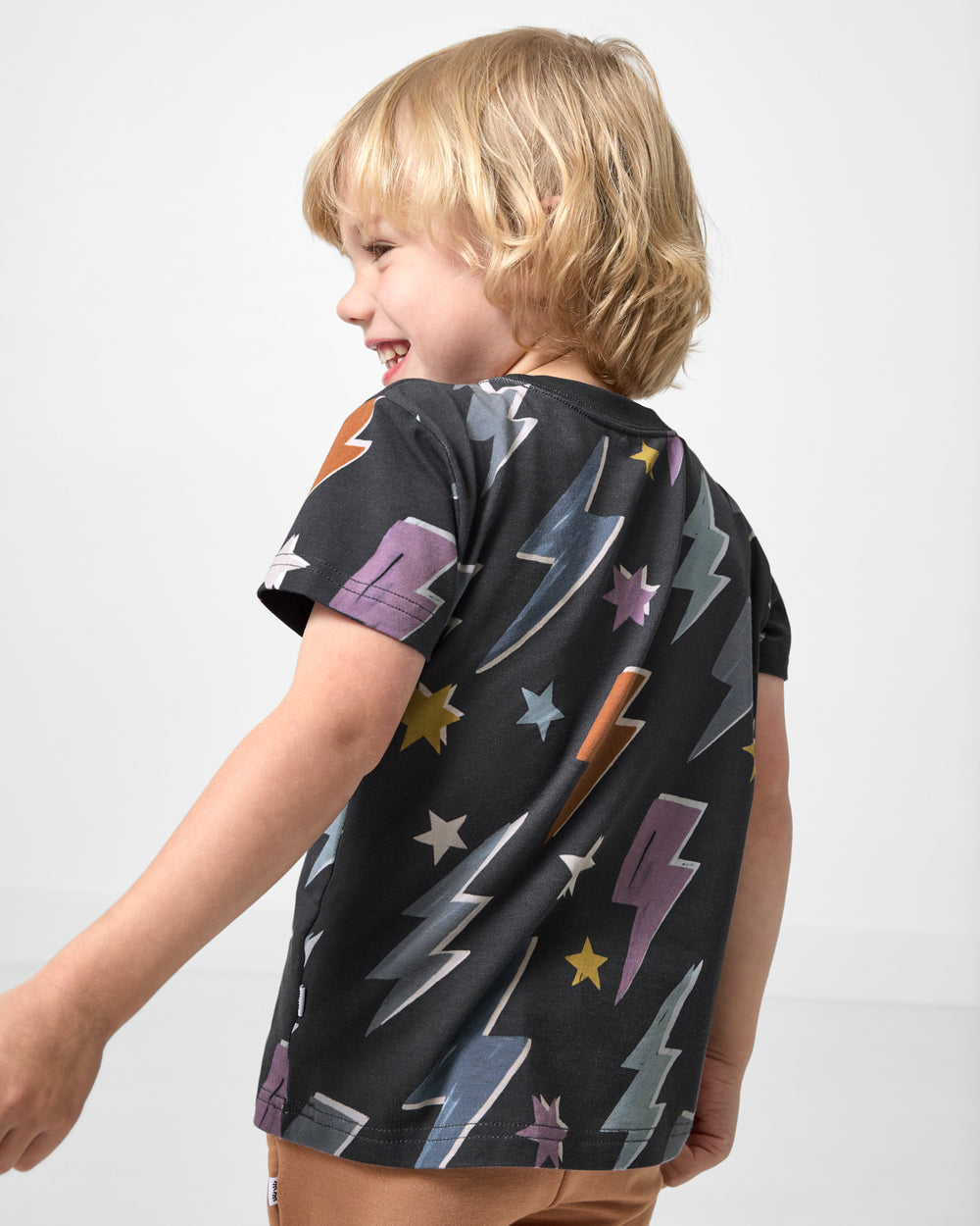 Back view of boy wearing the Rad Bolts Relaxed Tee