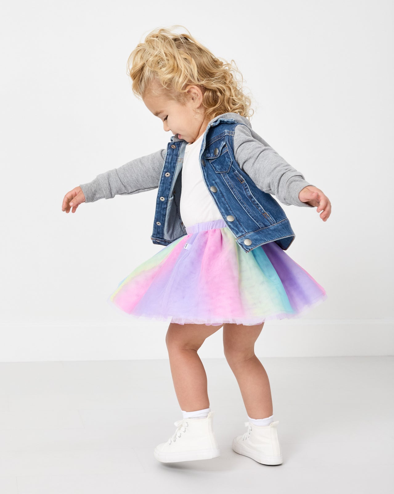 Twirling girl wearing the Rainbow Tutu Skirt