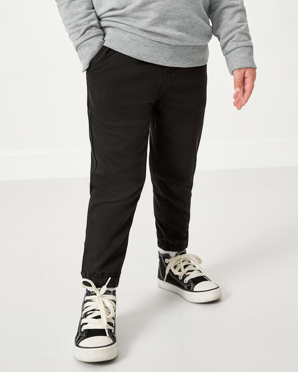 Boy wearing the Black Denim Jogger