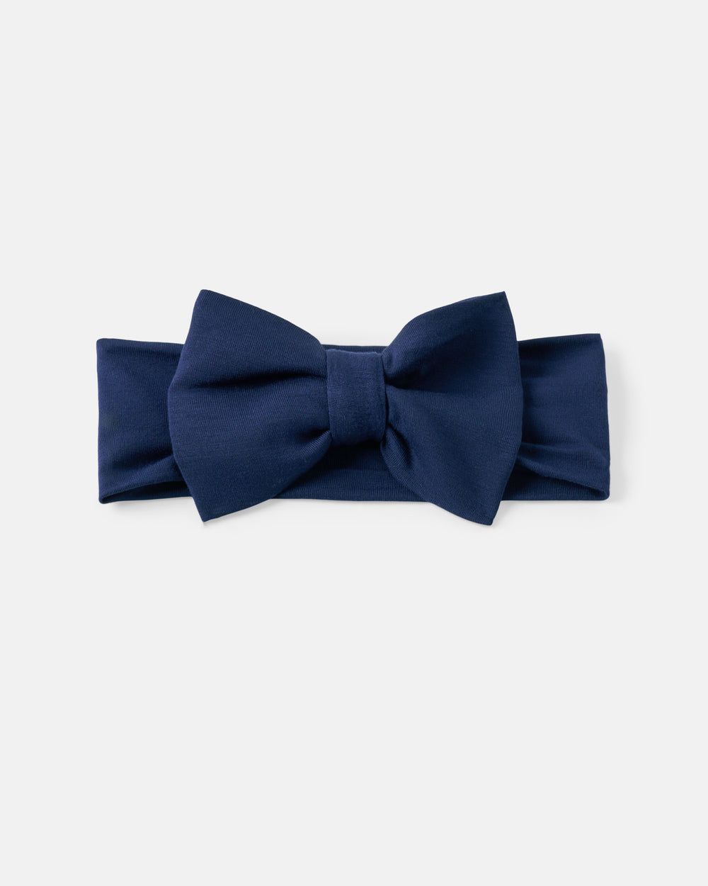 A navy blue bow headband set against a plain light gray background.