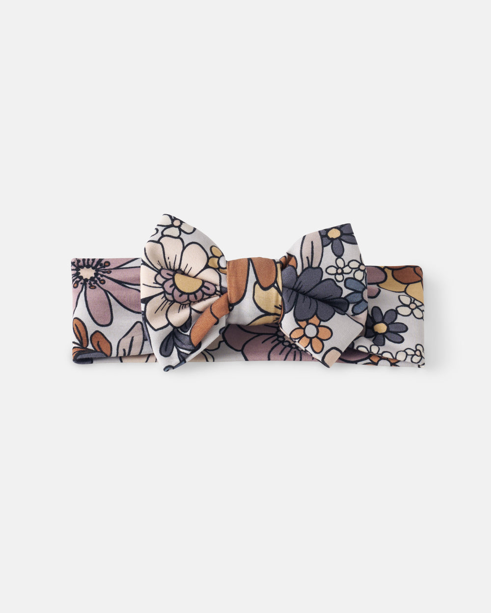 Flat lay of the Wildwood Floral Luxe Bow Headband