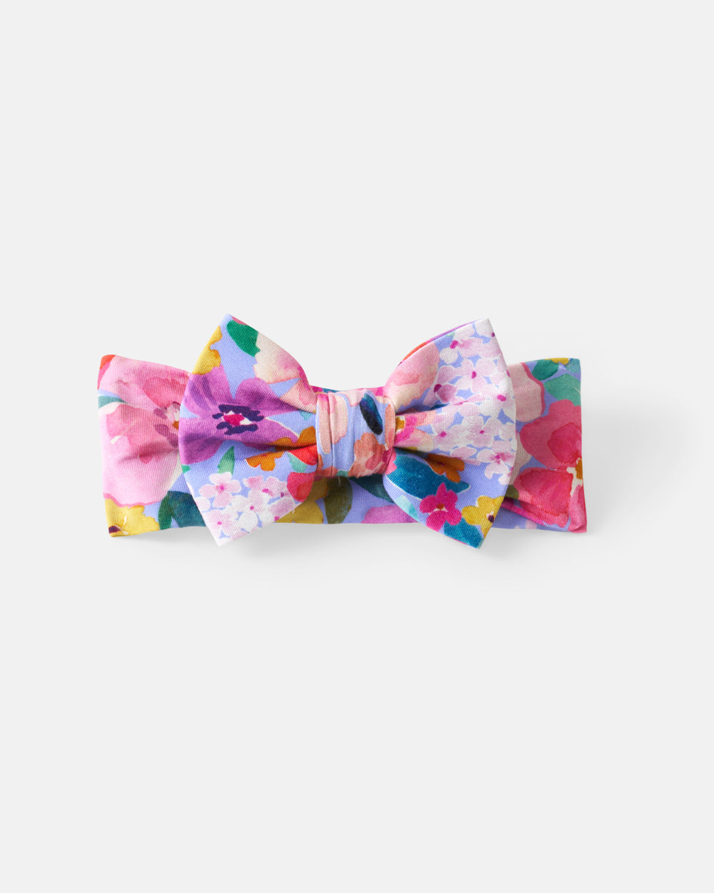 Flat lay of the Sweet Sprigs Luxe Bow Headband