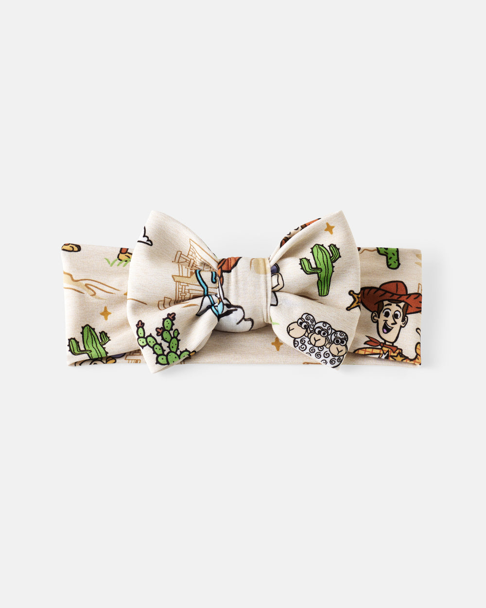 Flat lay of the Disney & Pixar Woody's Wild West Luxe Bow Headband