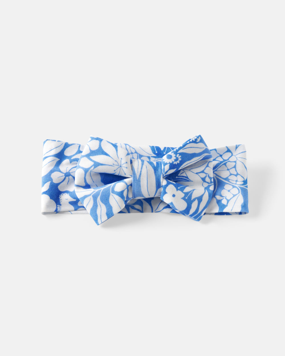 Flat lay of the Azure Garden Luxe Bow Headband