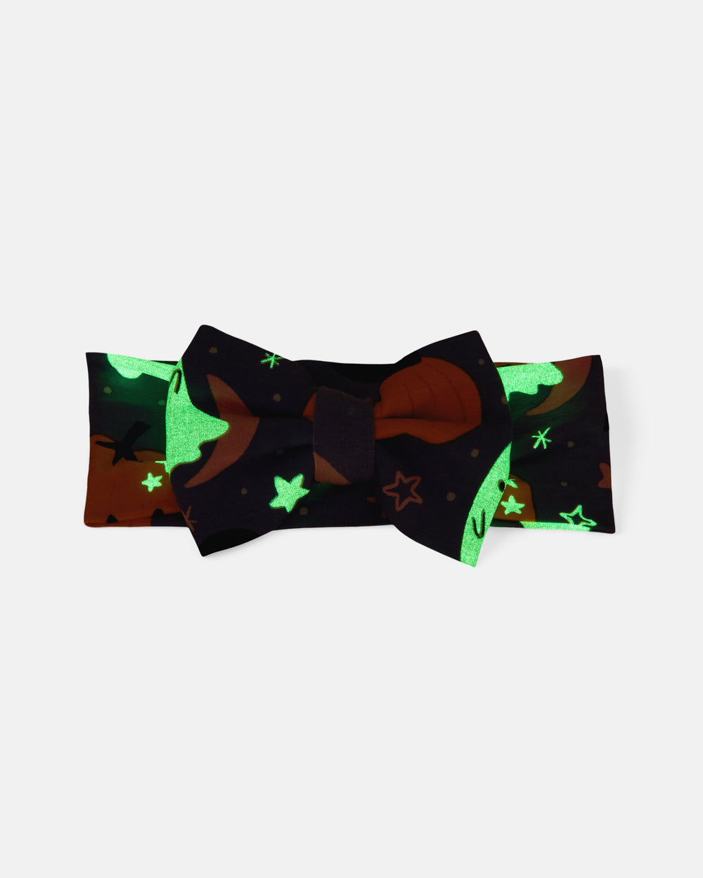 Flat lay of the glow in the dark Moonlit Magic Purple Luxe Bow Headband