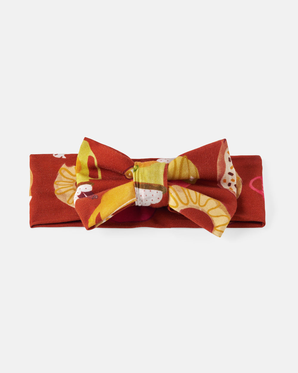 Flat lay of the Harvest Sweets Luxe Bow Headband