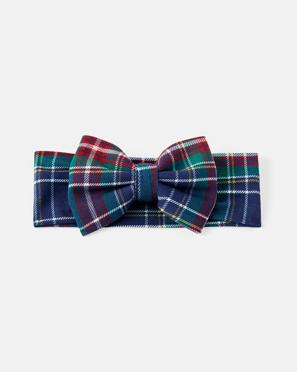 A classic plaid bow tie with a navy blue base and red, green, and white tartan stripes, presented flat against a light gray background.