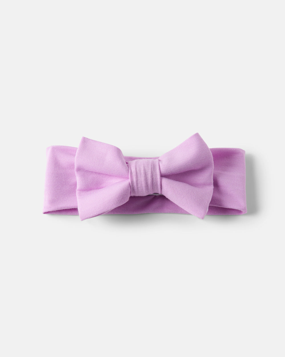 Flat lay of the Soft Wisteria Luxe Bow Headband