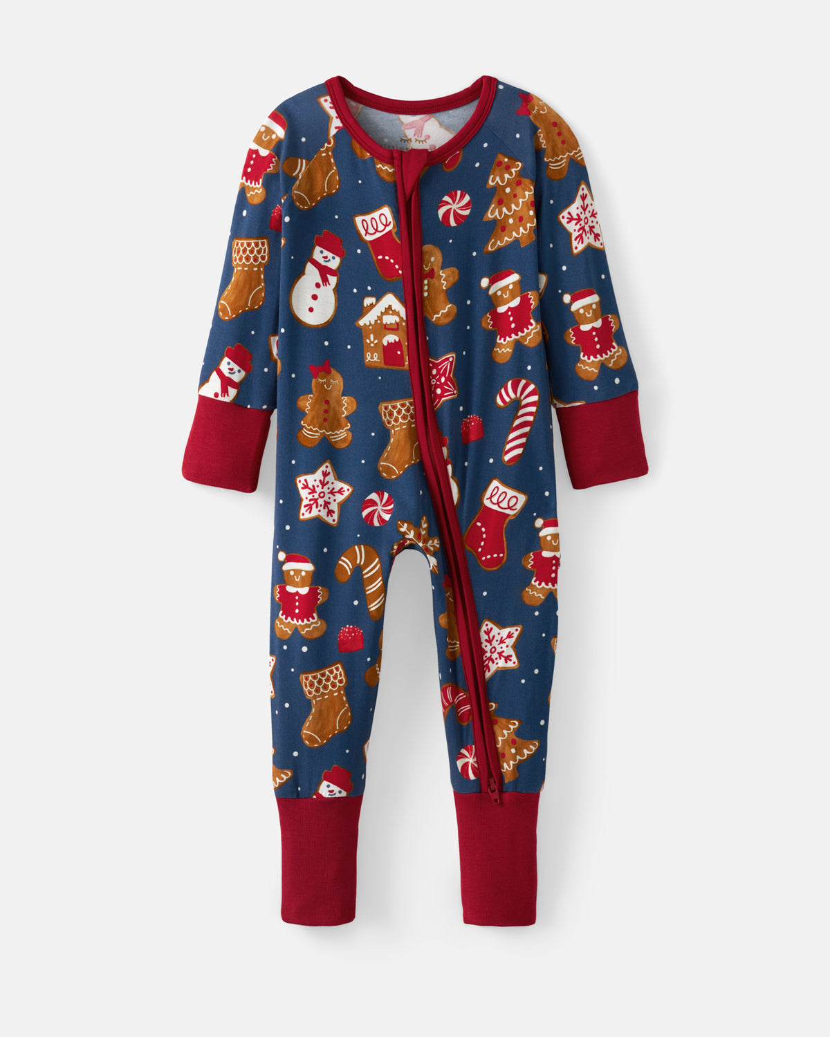 A baby's full-length zip-up footed sleeper with a festive Christmas print on a navy blue background, featuring red cuffs and hem, and holiday motifs like gingerbread men, stockings, candy canes, and snowmen.