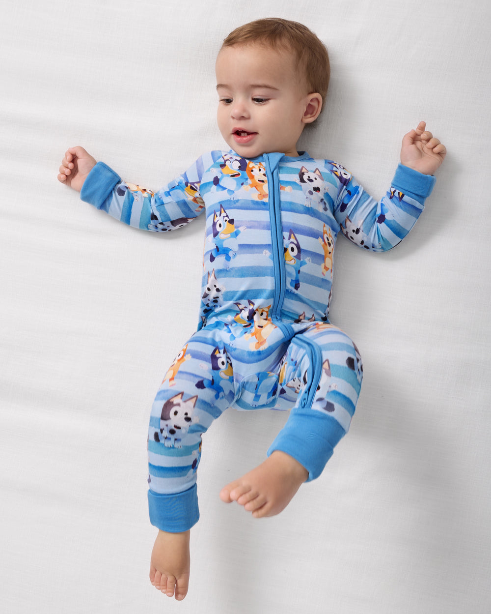 Alternate aerial view of baby wearing the Bluey Dance All Day Zippy