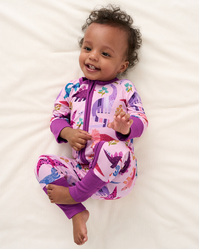Aerial view of baby wearing the Pink Roar & Explore Zippy