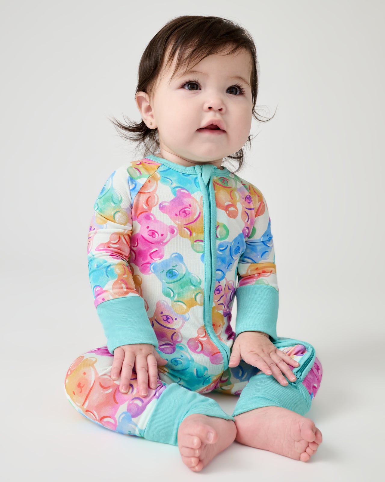 Baby wearing the Gummy Giggles Zippy