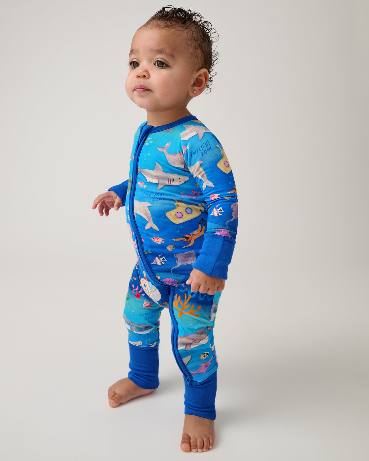 Standing child wearing the Underwater Discovery Zippy