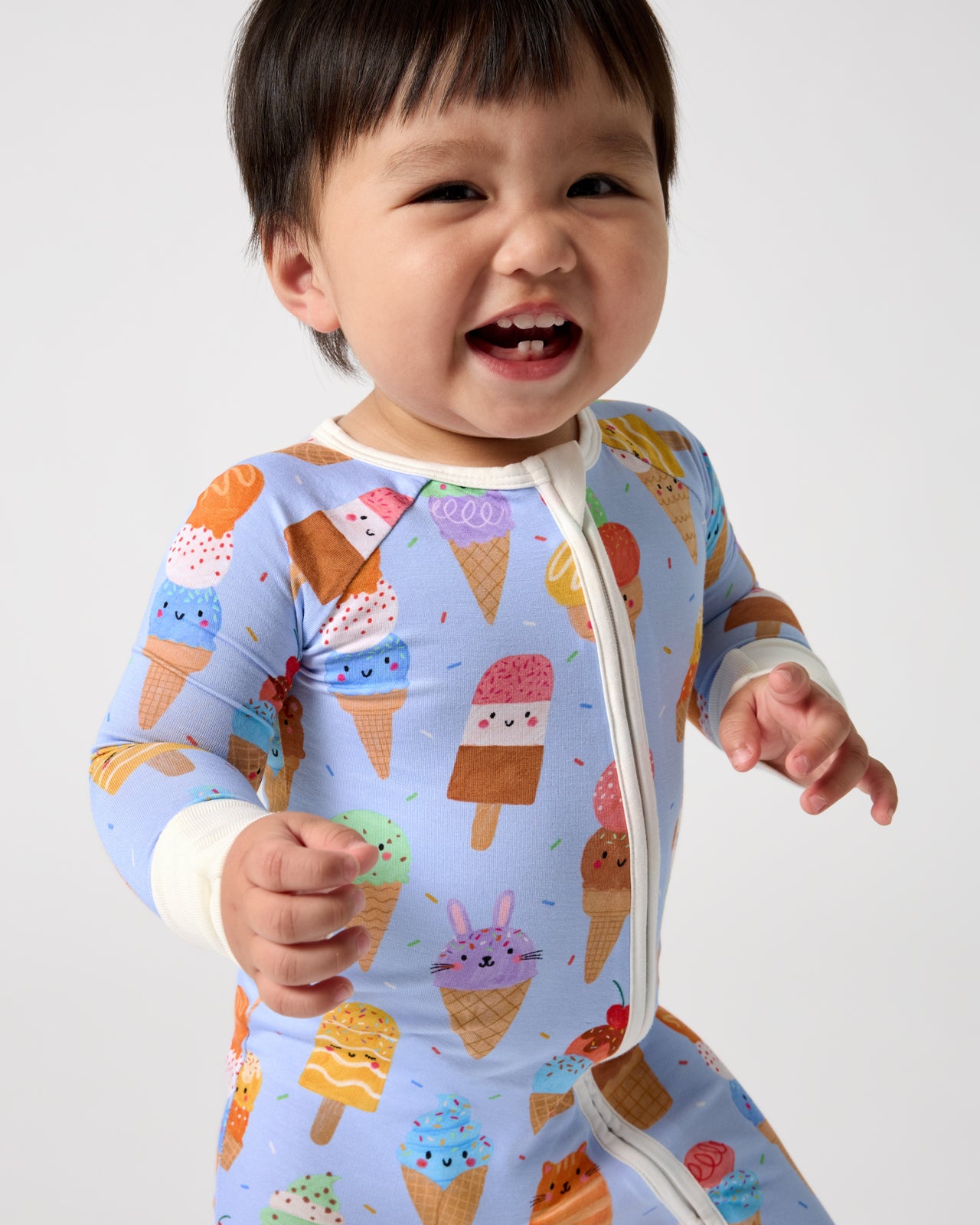 Close up of baby wearing the Scoop Squad Zippy