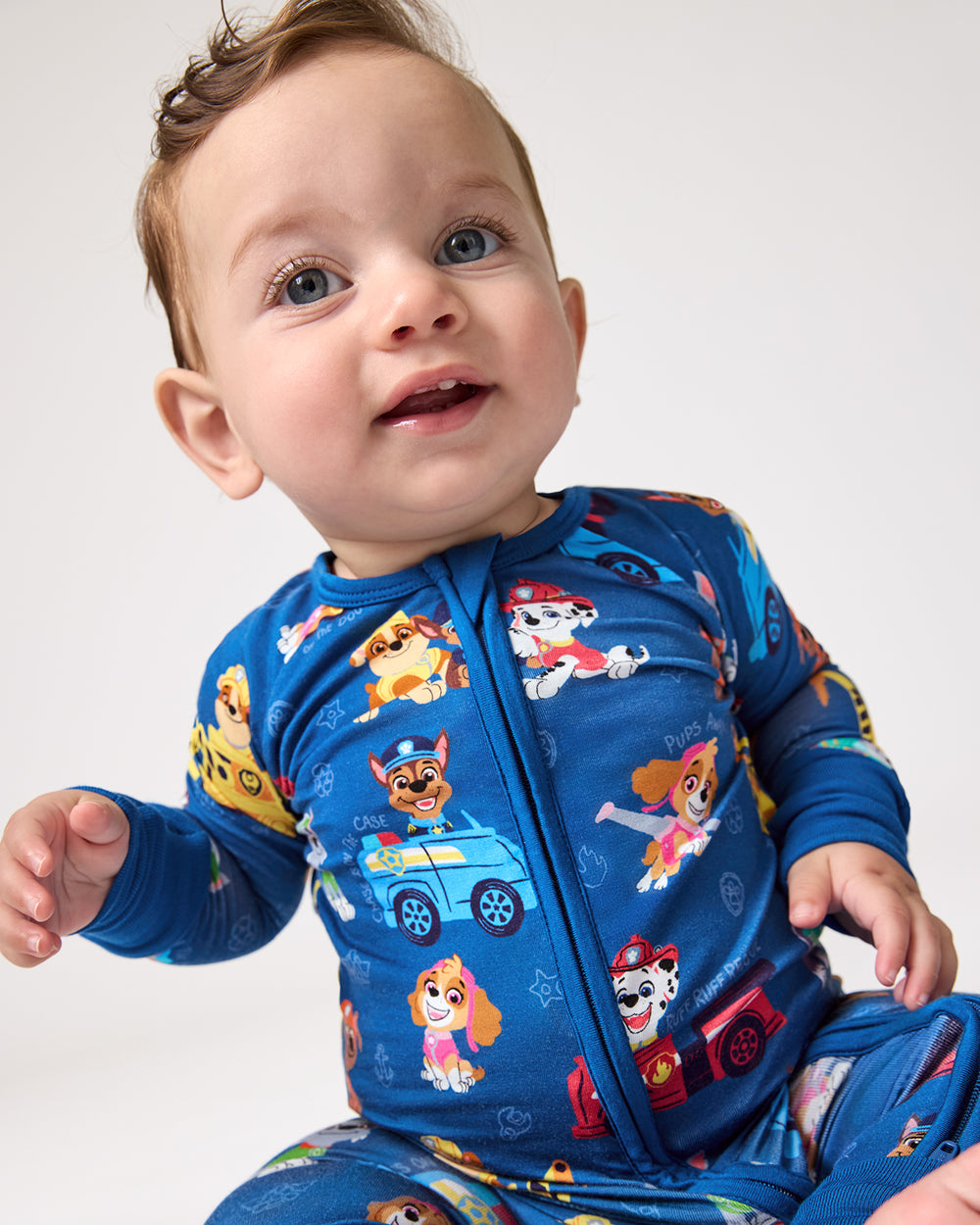 Close up of baby boy wearing the PAW Patrol Adventure Bay Heroes Zippy