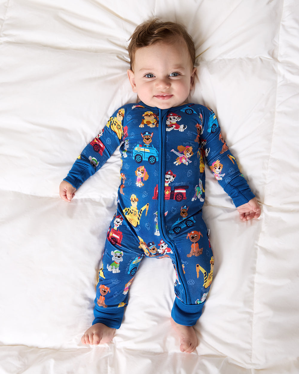 Aerial view of baby wearing the PAW Patrol Adventure Bay Heroes Zippy