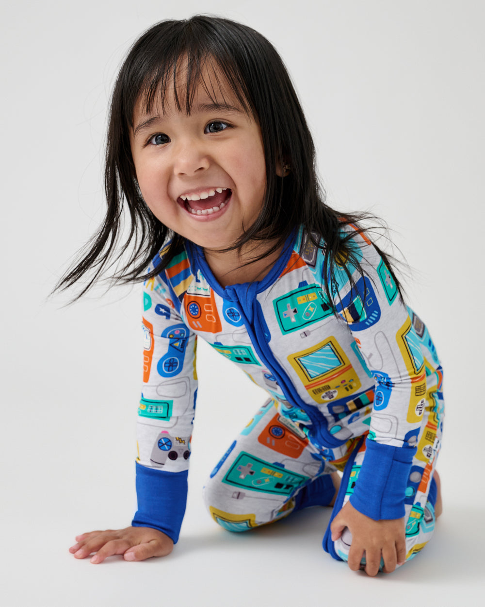 Toddler wearing the Game On Zippy