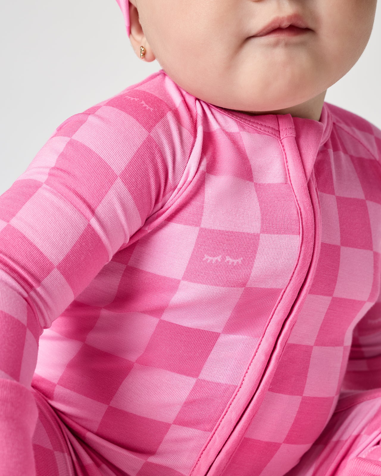 Close up of the zipper detail on the Sweet Raspberry Checks Zippy