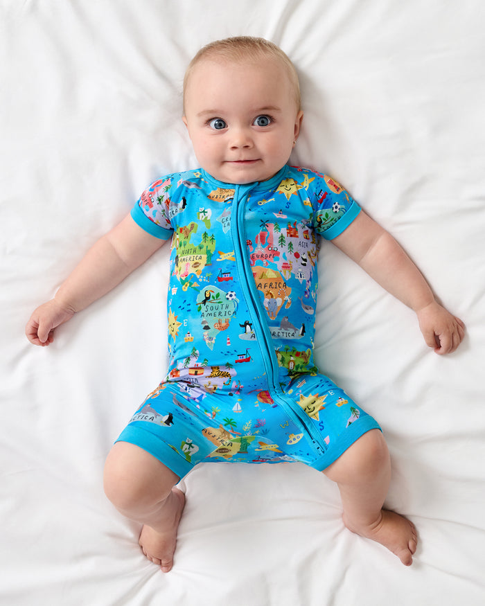 Aerial view of baby wearing the Around The World Shorty Zippy