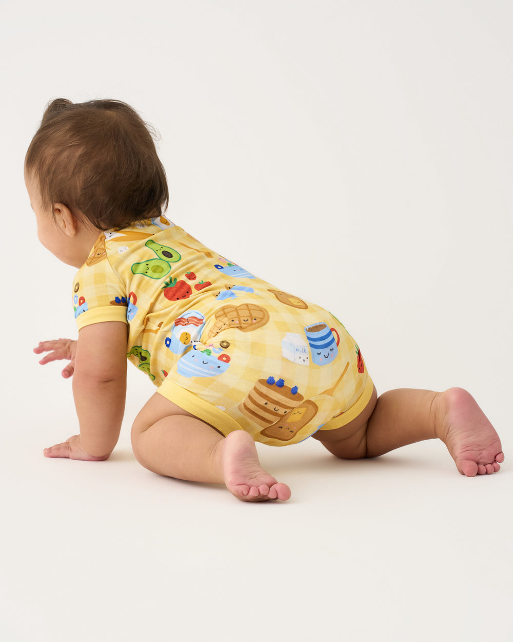 Crawling baby wearing the Breakfast Bunch Shorty Zippy
