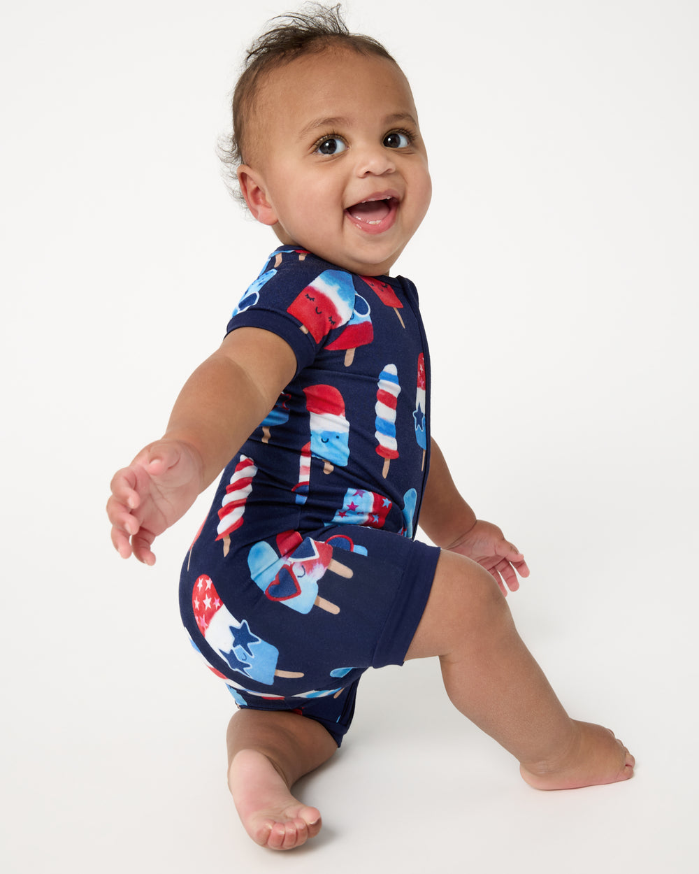 Child in motion wearing the Sparkle Treats Shorty Zippy