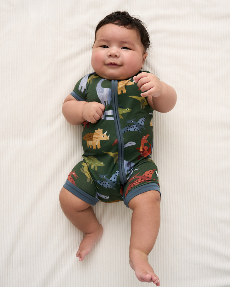 Alternate overhead view of baby wearing the Green Roar & Explore Shorty Zippy
