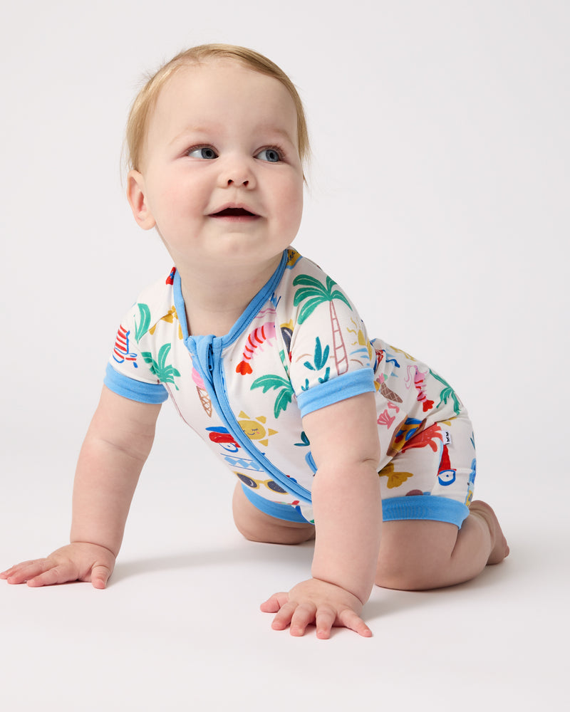 Crawling baby wearing the Ciao Bella Shorty Zippy