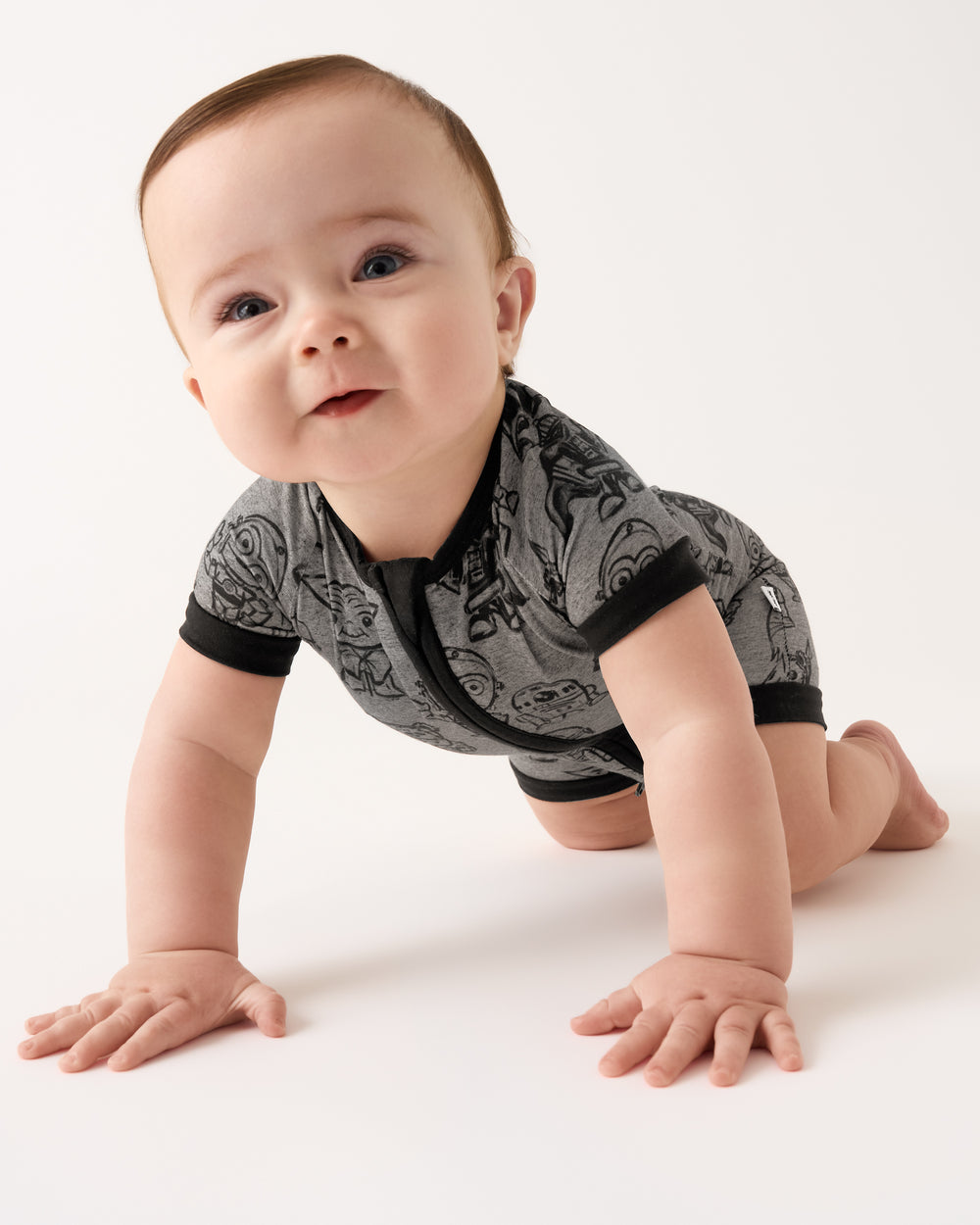 Crawling baby wearing the Star Wars Far, Far, Away Friends Shorty Zippy
