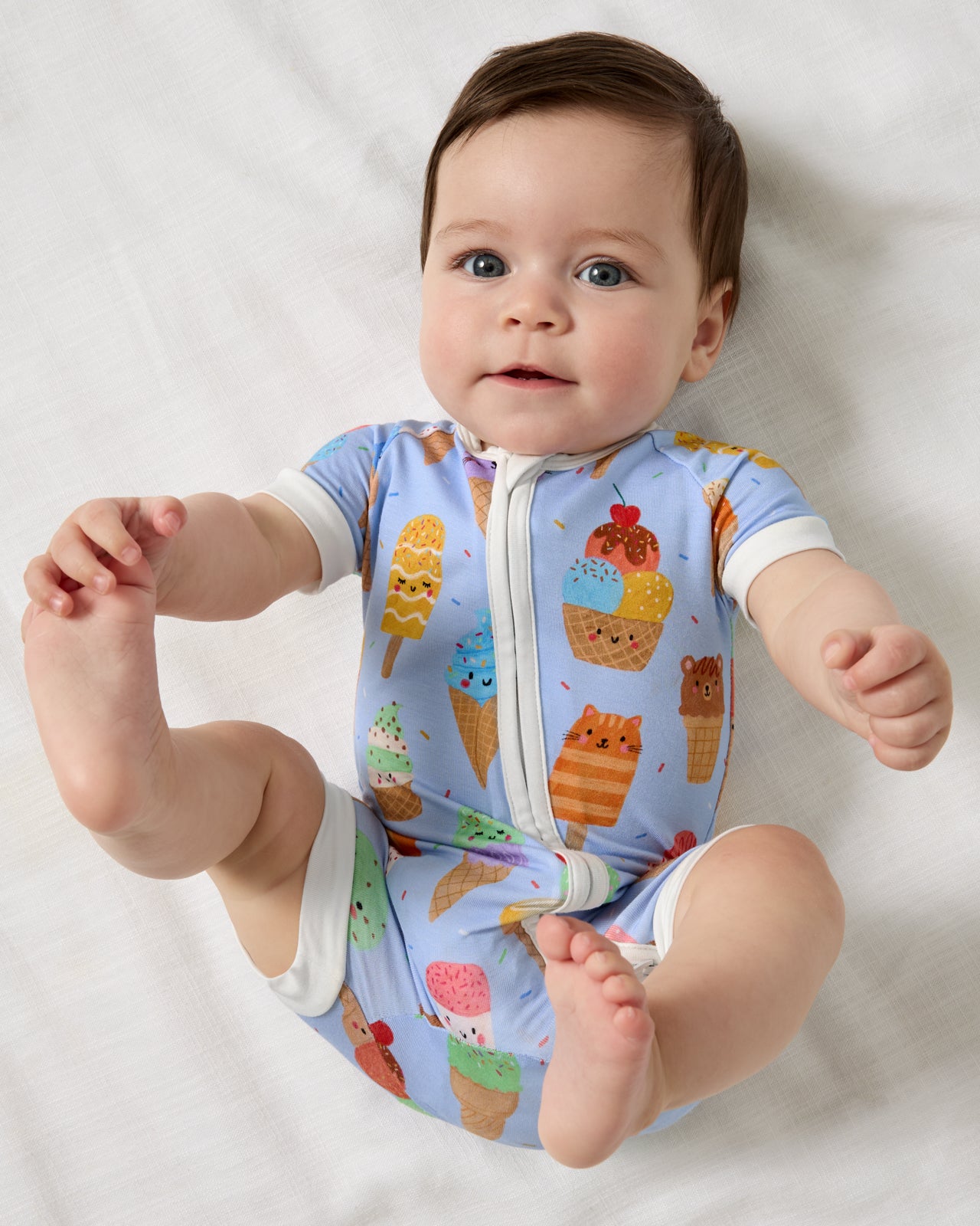 Aerial view of baby wearing the Scoop Squad Shorty Zippy