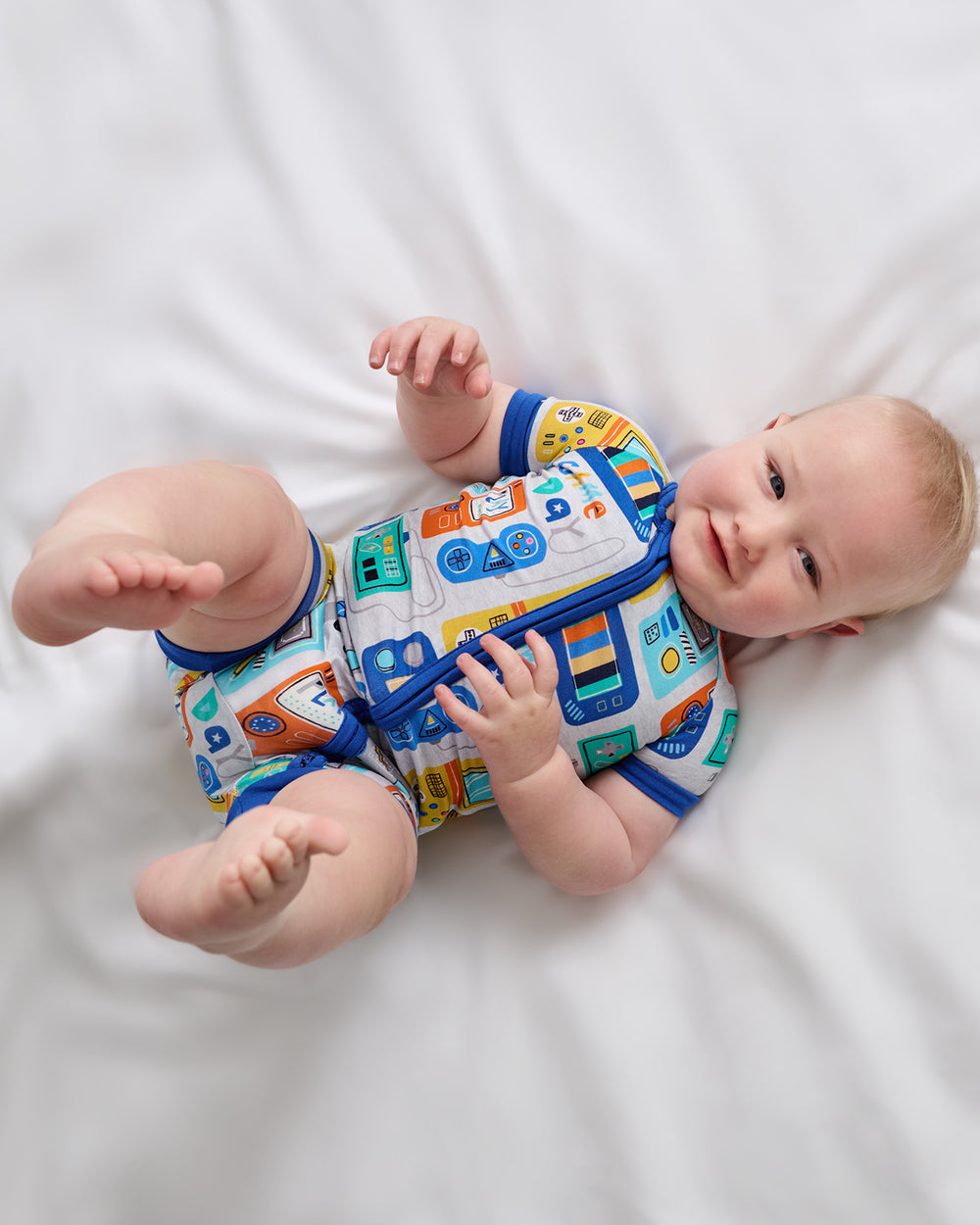 Aerial view of baby wearing the Game On Shorty Zippy