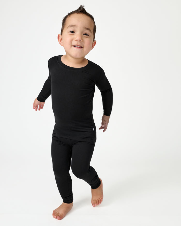 Boy wearing the Black Two-Piece Pajama Set