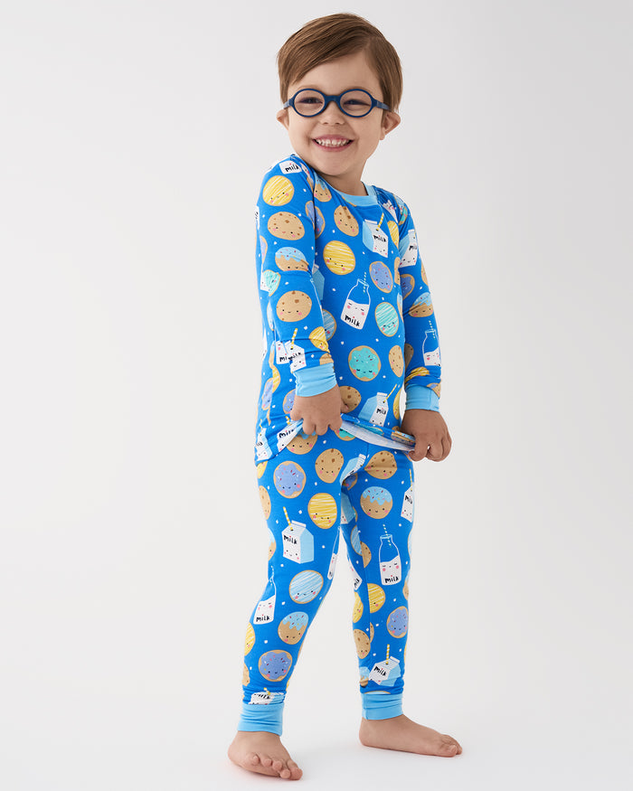Boy wearing the Blue Cookies & Milk Two-Piece Pajama Set