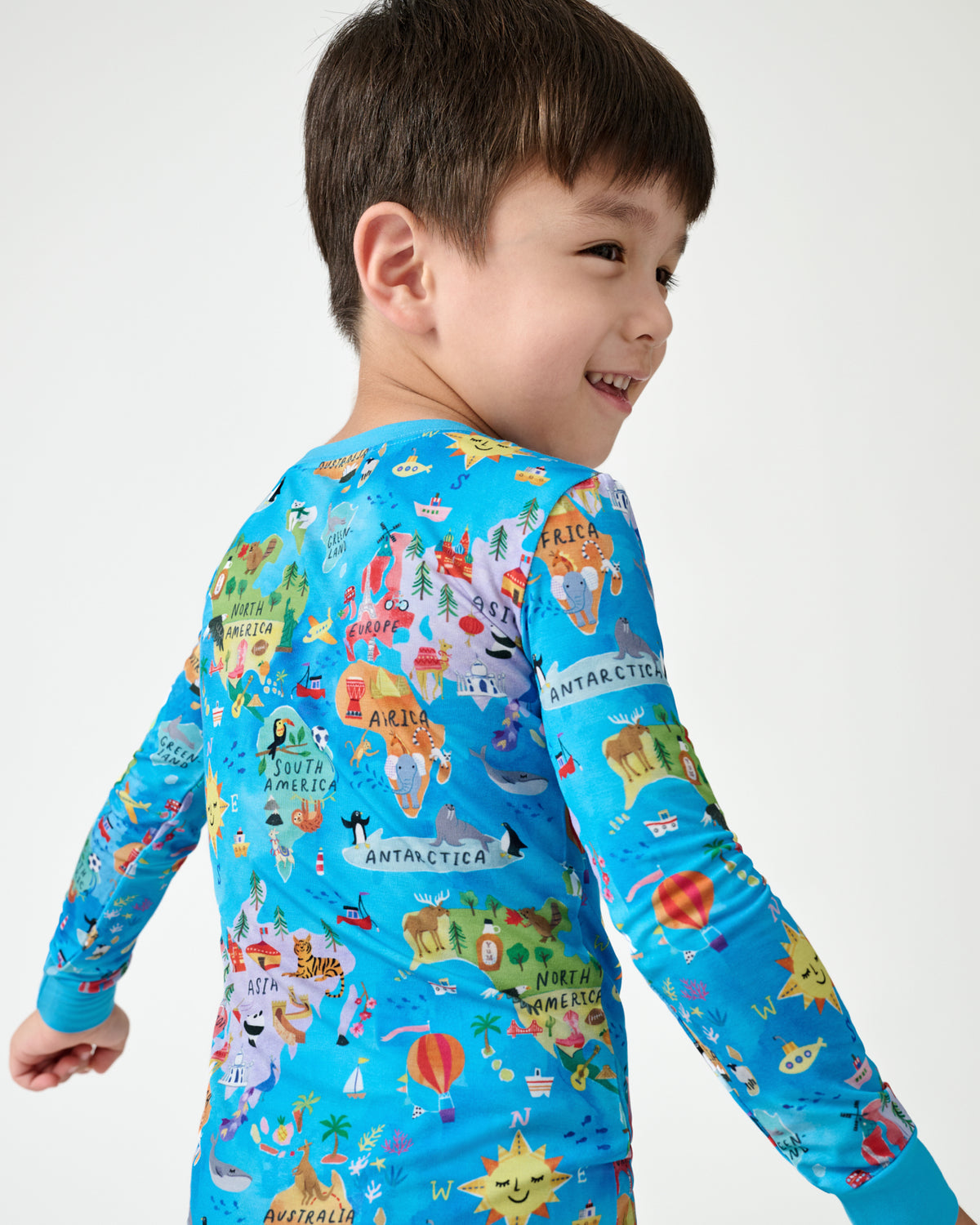 Back view of child wearing the Around The World Two-Piece Pajama Set