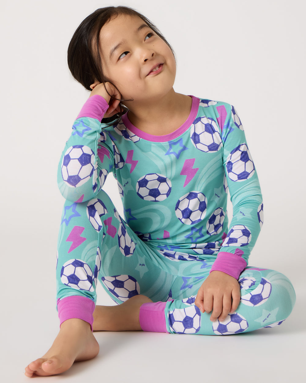 Alternate of sitting child wearing the Aqua Soccer Stars Two-Piece Pajama Set