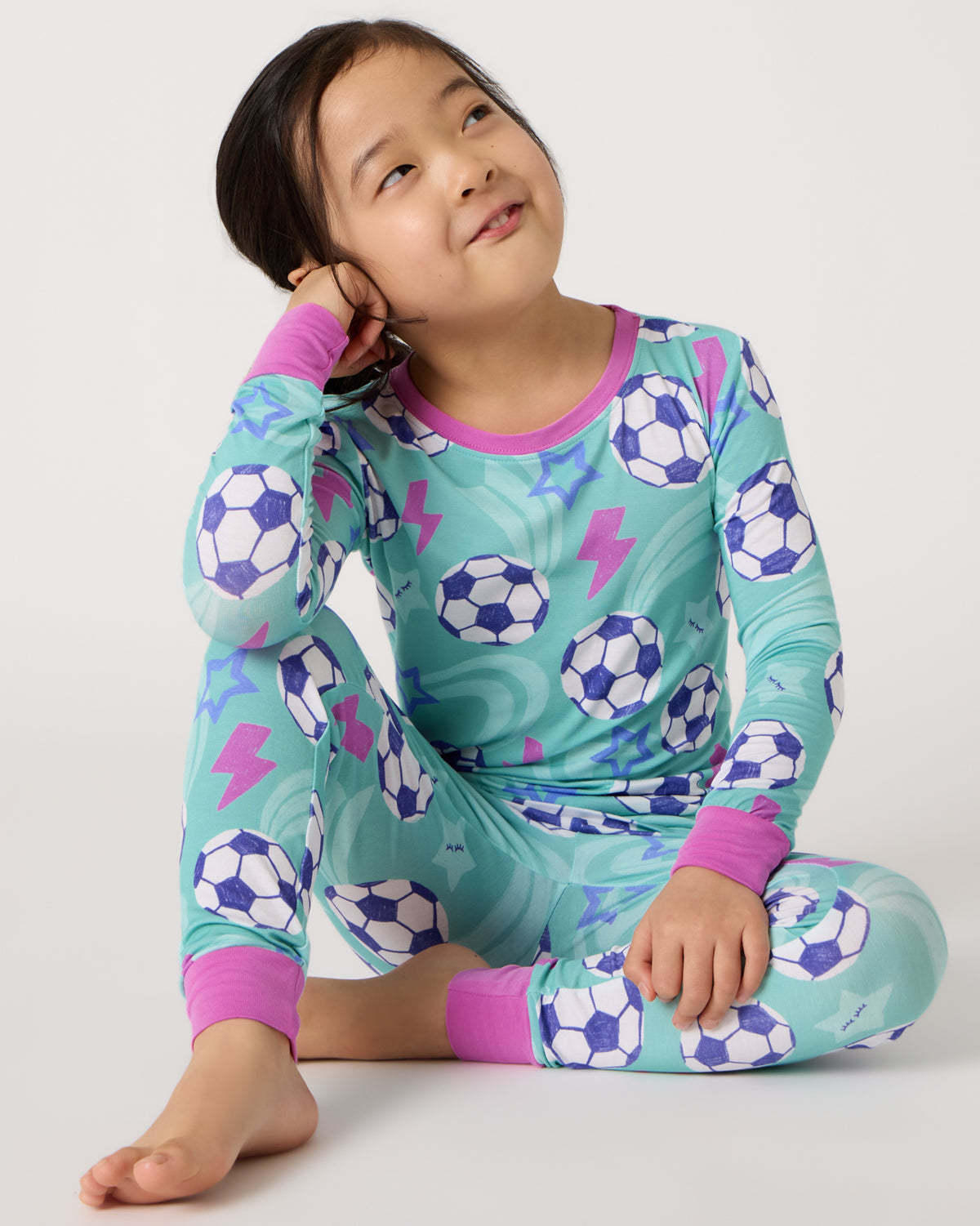 Alternate of sitting child wearing the Aqua Soccer Stars Two-Piece Pajama Set