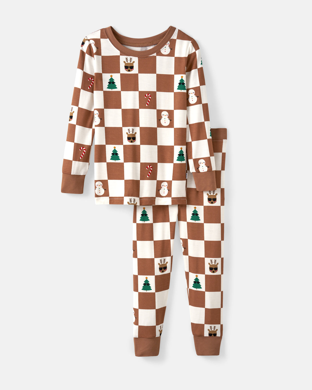 A two-piece long-sleeve pajama set for kids, featuring a brown and cream checkerboard pattern with small Christmas-themed illustrations like snowmen, candy canes, and pine trees, shown on a light gray background.