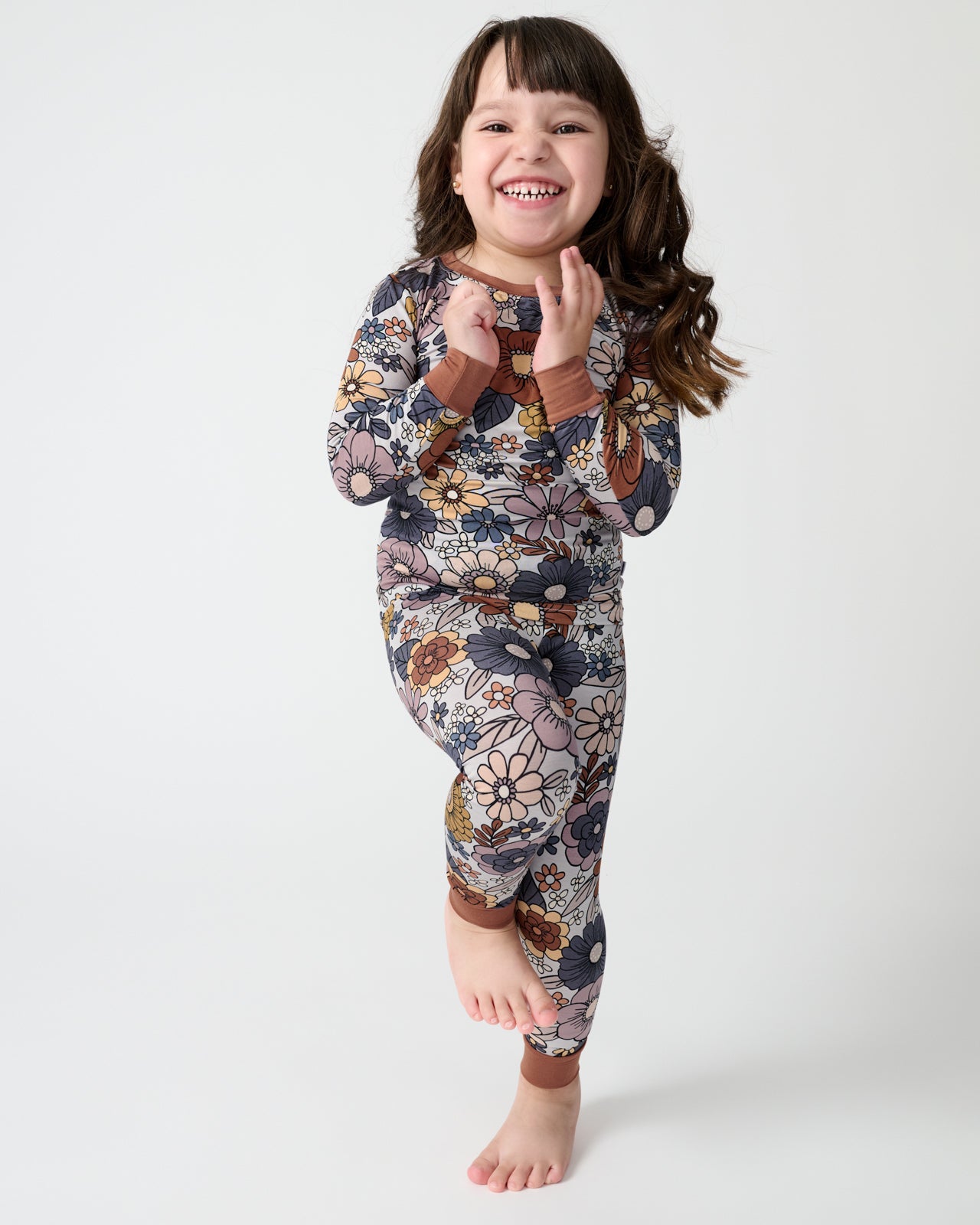 Girl wearing the Wildwood Floral Two-Piece Pajama Set