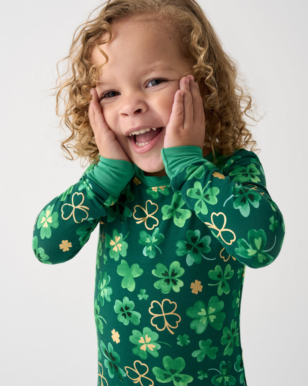 Posing girl wearing the Clover Cuties Two-Piece Pajama Set