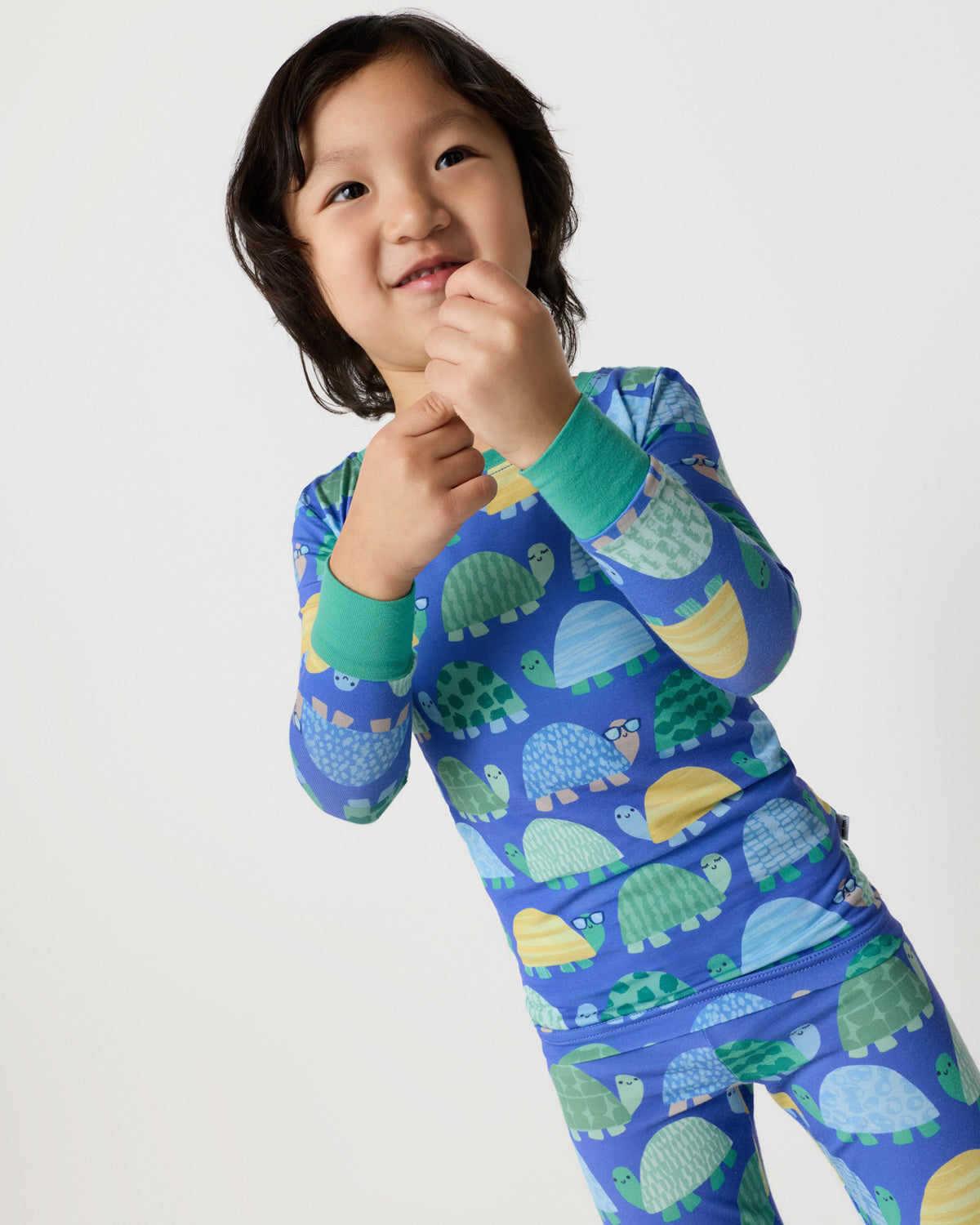 Close up of child wearing the Shell Parade Two-Piece Pajama Set