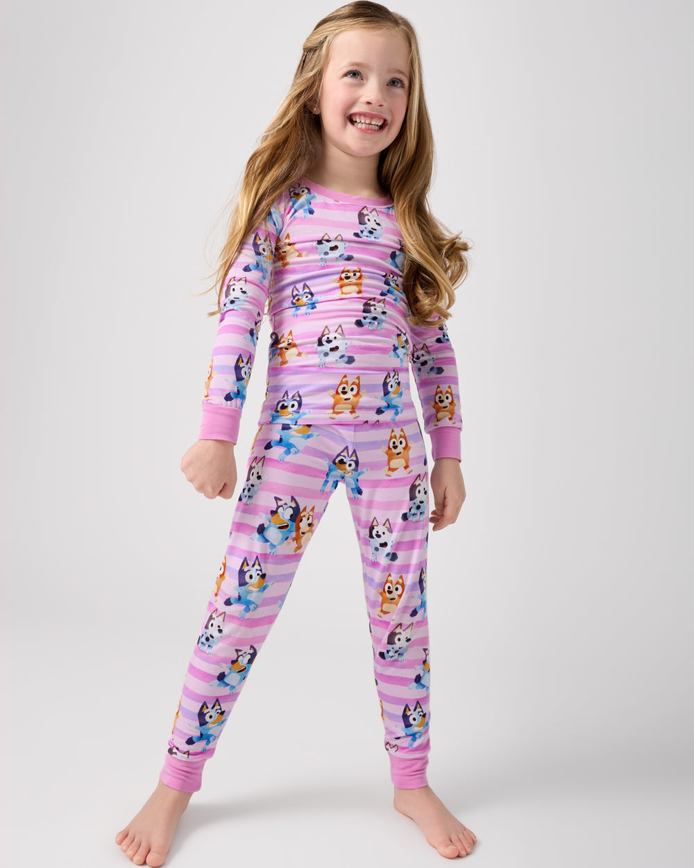 Standing girl wearing the Pink Bluey Dance All Day Two-Piece Bamboo Pajama Set