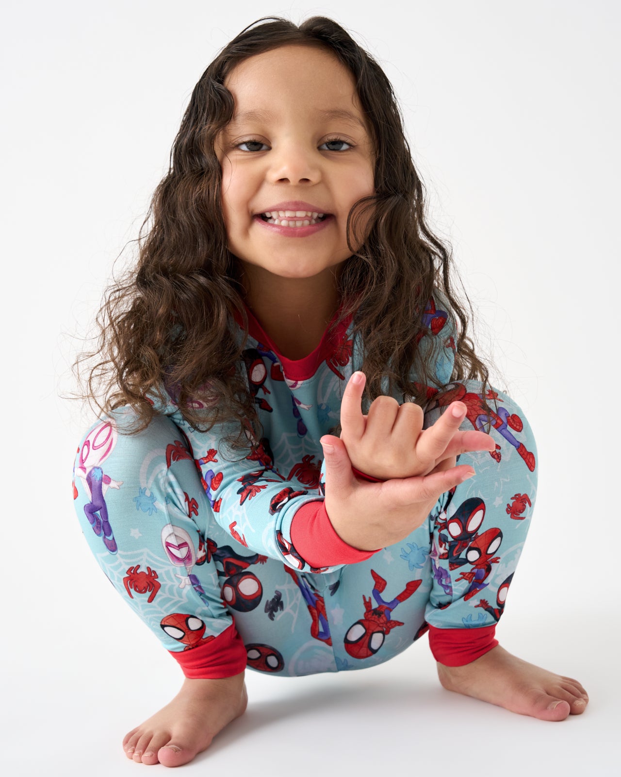 Girl wearing the Spidey & Friends Tiny Webs Two-Piece Pajama Set